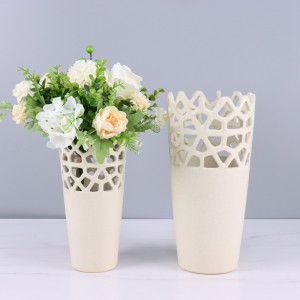 Maceta e florero de cerámica para decoración con forma oco