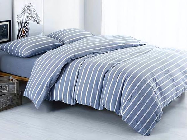 How often should bed sheets and duvet covers be washed?