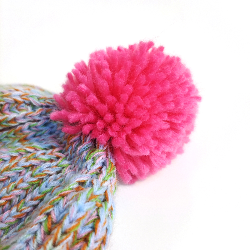 Beanie hat with pompon mixed color yarn