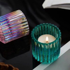 Porta espelmes de vidre amb ratlles que s'utilitza per al sopar de la festa del casament