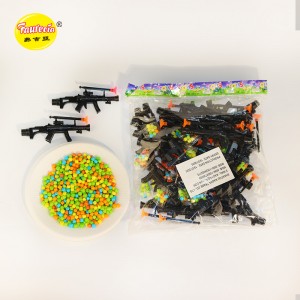 포레시아 저격총 모양의 장난감과 다채로운 캔디