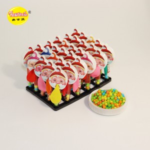 रंगीन कैंडी के साथ 'सांता क्लॉज़ गुब्बारे उड़ाते हुए' मॉडल खिलौना फ़ौरेसिया