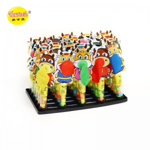Faurecia soprando balões-modelo de vaca com doces coloridos