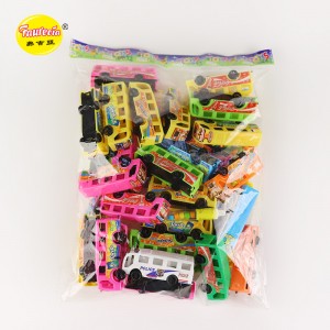 Faurecia-Busse formen Spielzeug mit bunten Süßigkeiten (2kodp)