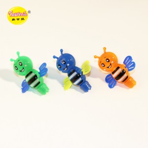 Faurecia mainan bentuk lebah gembira dengan gula-gula berwarna-warni