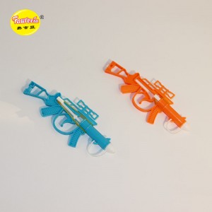 Faurecia katapultový model ostreľovacej pušky s farebnými cukríkmi