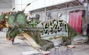 Estatua de dinosauro decorativa Cadeira de dinosauro de fibra de vidro Equipo de parque para nenos FP-2414