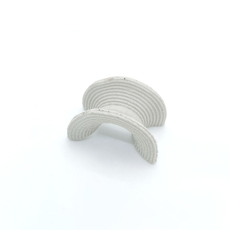 Keramikinis intalox balno žiedas su banguotu