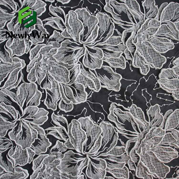 Произведено во Кина Трајна мрежеста ткаенина за везење од полиестерски тул текстура извезена тантела ткаенина за забава