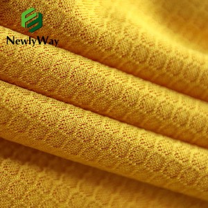 Polyester and spandex cationic grid brazing stretch double color mesh fabric spot supply sportswear fabrics