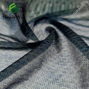 Unik slangeskinnsdesign trykt blonder nylon stretch tricot strikket stoff online engros