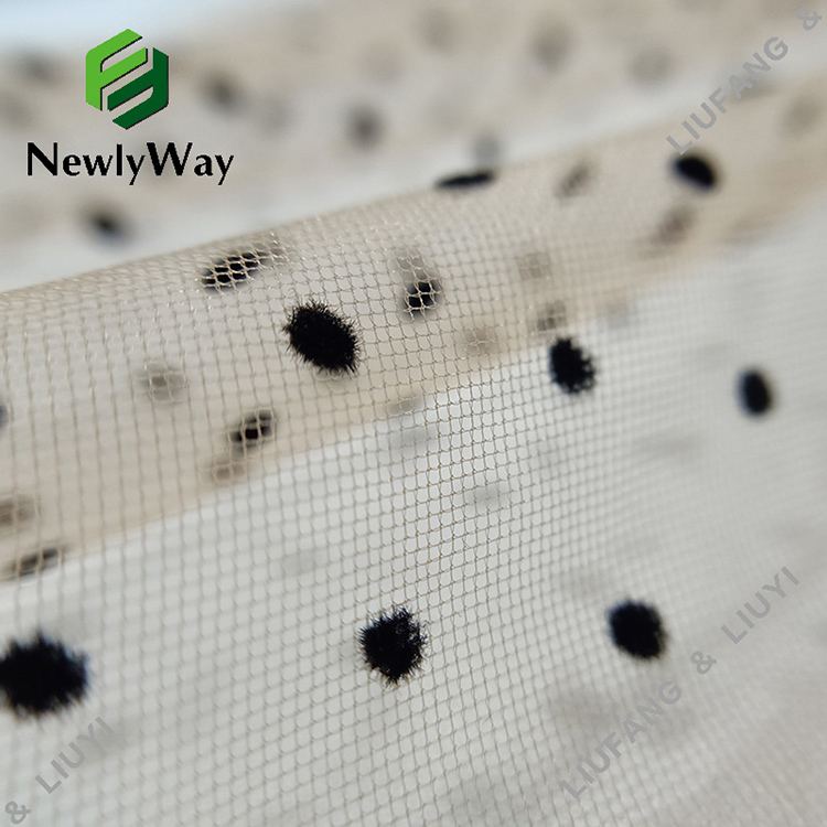 Black polka dot flocked nylon tulle fabric for the skirts