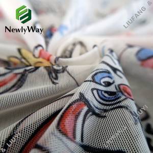 Tegneserietrykt polyester spandex mesh blonder tricot strikket stoff for motekjole