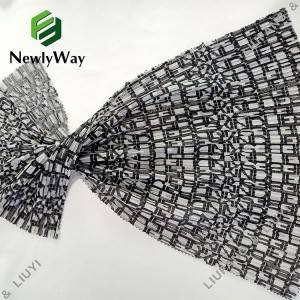Tessuto in filato di poliestere plissettato e tessuto di pizzo a rete di tulle stampato per abito