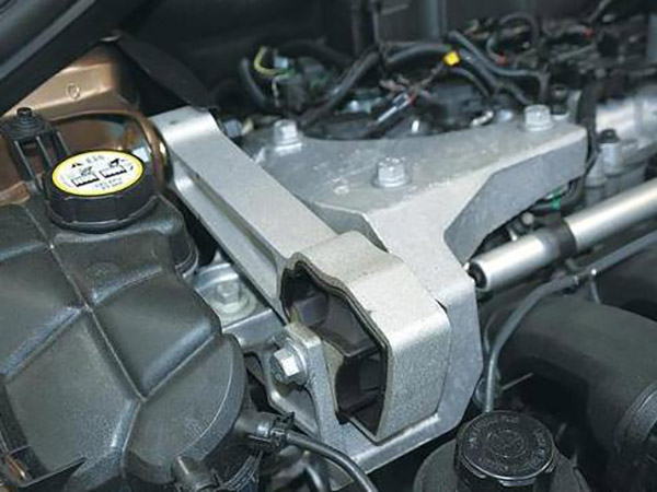 What does the engine mount do and how is the engine connected to the mount?
