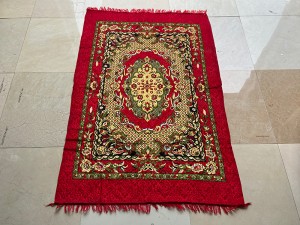 The pilgrimage blanket used by Muslims daily