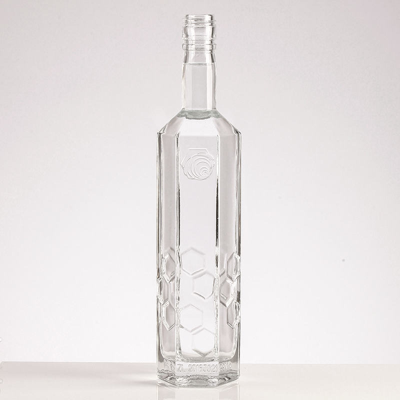 Wholesale diamond surface glass wine liquor bottle Glass brandy bottle with lid Featured Image