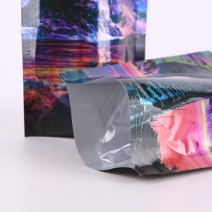 કસ્ટમ ડિઝાઇન પ્રિન્ટેડ હીટ સીલ હોલોગ્રાફિક ઝિપલોક બેગ સ્ટેન્ડ અપ પેકેજિંગ સ્મેલ પ્રૂફ માઇલર પાઉચ બેગ્સ