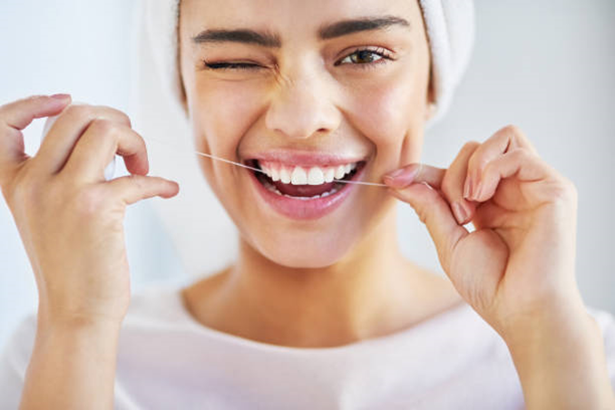 Como usar o fío dental?