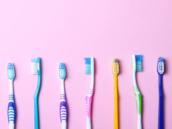 How are the bristles of a toothbrush planted on the toothbrush handle?