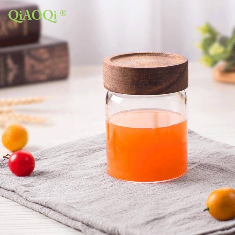 Different size empty clear 125ml 4oz glass borosilicate bee honey jars with wood bamboo lids for jam packing wholesale