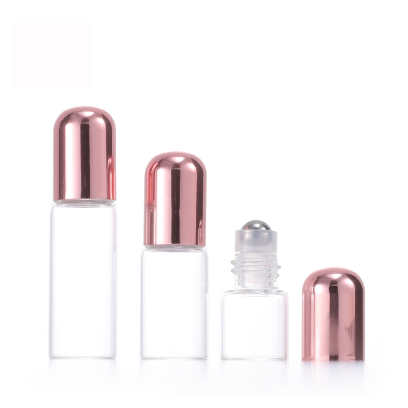 RB-T-0054-clear-small-glass-roller-bottle-with-rose-gold-cap