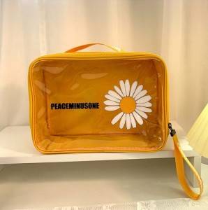 The new web celebrity PVC small Daisy makeup bag portable cosmetics wash and gargle storage travel makeup bag