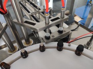Automatisk påfyldningsmaskine til flaske med æterisk olie