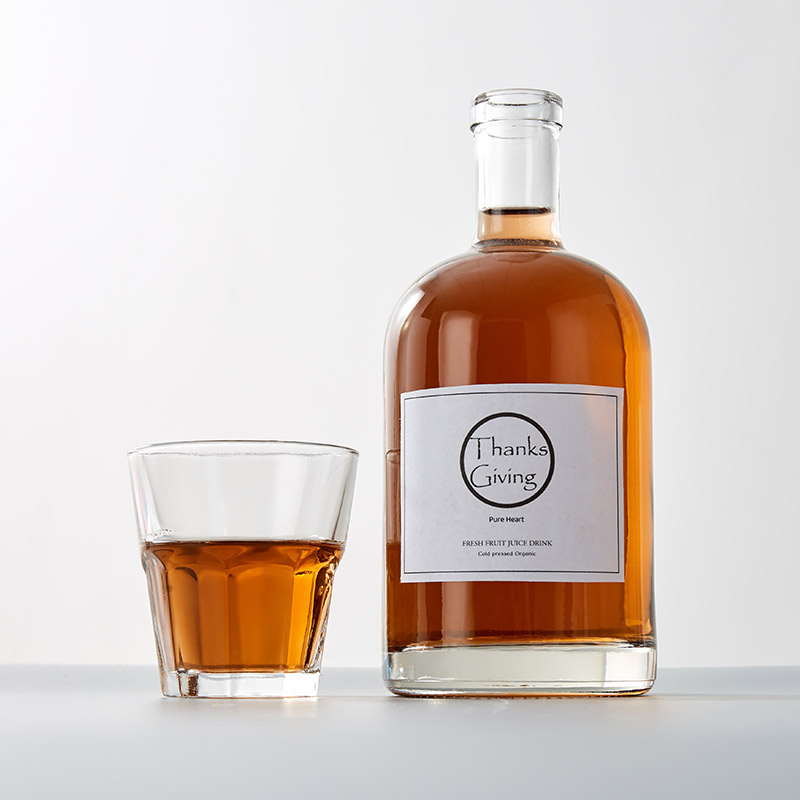 အရည်အသွေးမြင့် အဝိုင်းပုံစံ Nordic Clear Glass Whisky Rum အဖျော်ပုလင်း