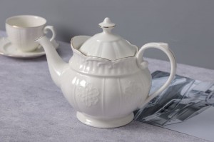 Set de té de porcelana duradeira branca con borde dourado