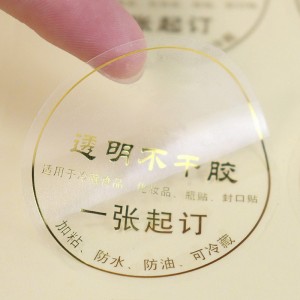 Mukautetun logon kiiltävä läpinäkyvä vedenpitävä pyöreä tarra