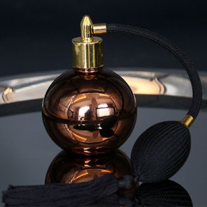 Botella atomizadora redonda chapada en cobre con bolsa de aire 100ml