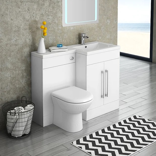 Enodelno oblikovano stranišče z integriranim umivanjem rok, ki varčuje z vodo