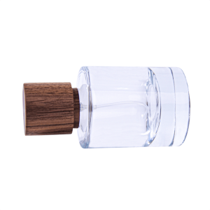 Ampolla de vidre de perfum amb tap de fusta