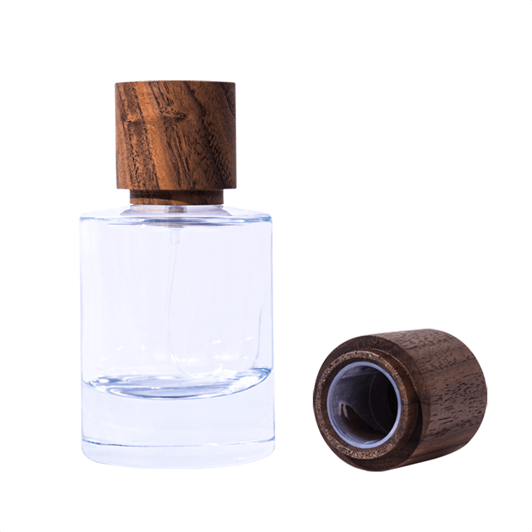 Smaržu stikla pudele ar koka vāciņu
