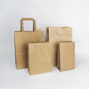 China manufacturer custom brown kraft paper bag with your logo design
