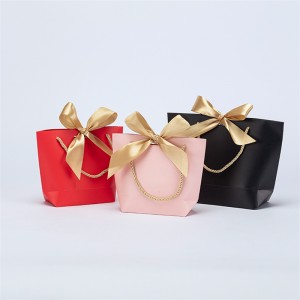 China High Quality Kraft Paper Bag No Handle Manufacturer –  Bow Ribbon Round Rope Hand Held Art Paper Bag – Shengyuan