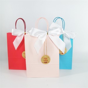 China High Quality Black Paper Bag No Handle Exporters –  White Kraft Paper Bag Decorated With Label Bows – Shengyuan