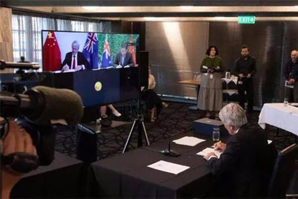 China and New Zealand on Tuesday signed a proto...