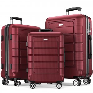 Den røde ABS kuffert er slidstærk og har rullekuffert med hjul