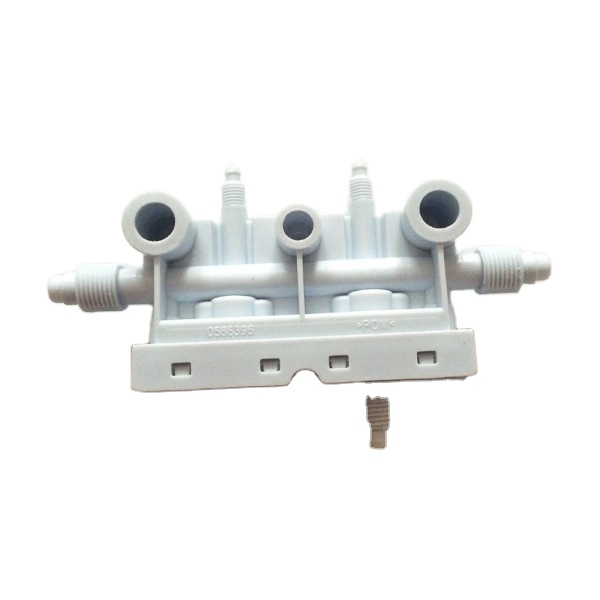 white central valve volkman spare parts in textile machinery.. Featured Image