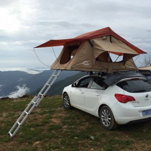 Auto jumta telts ar mīksto apvalku