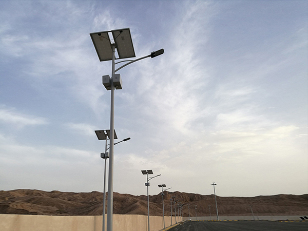 How can solar street lamps be controlled to only illuminate at night?