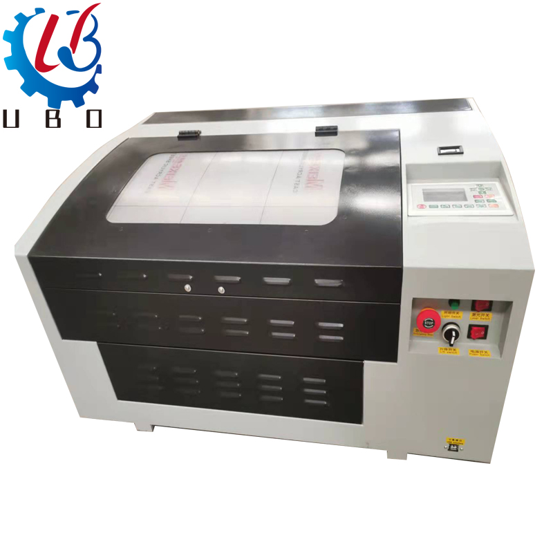 Mini co2 stamp laser engraving cutting Machine for agent price Featured Image