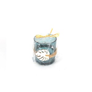 Glass cup candle decorated with straw rope