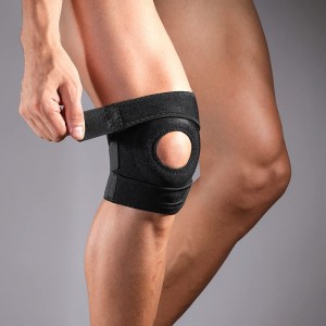 Envoltura de soporte de rodilla ajustable para aliviar el dolor.