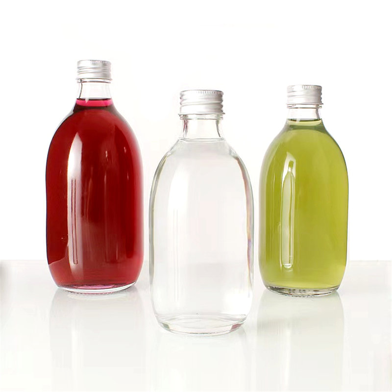 Venta al por mayor de botellas de vidrio redondas para bebidas de 300 ml y 500  ml - Fabricante confiable de botellas, frascos y recipientes de vidrio