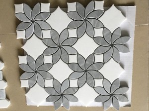 Mosaico de flores de mármore con chorro de auga Gris e brancos
