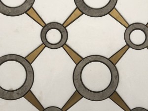 Piastrella a mosaico rotonda in marmo bianco e oro a getto d'acqua all'ingrosso per parete