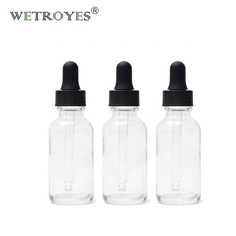 1 OZ 30 ML Clear Boston Round Glass Bottle with Dropper Cap Featured Image